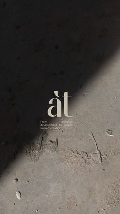 the cover of at magazine with footprints in the sand and sun shining on it's surface