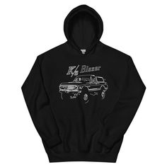 a black hoodie with the words zeeb on it and a car in front