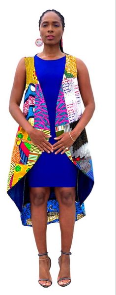 With an S on your chest, come through with this cape-like, lightweight, and vibrant flowing vest. Made with hand-stitched patches of African wax fabric, our Superwoman vest gives you the cover needed while showing off your figure. Wear it with solid colored leggings, a pencil skirt, shorts, dress or even jeans. Go sexy with heels or dress it down with flats or sandals. Has a razor-back design. Spring Multicolor Stretch Vest, Bohemian Sleeveless Outerwear For Spring, Sleeveless Bohemian Summer Outerwear, Bohemian Sleeveless Summer Outerwear, Multicolor Patchwork Vest For Summer, Fitted Sleeveless Outerwear For Festival, Blue Sleeveless Patchwork Vest, Blue Patchwork Sleeveless Vest, Sleeveless Cotton Outerwear For Festivals