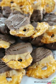 chocolate covered pretzels on a white plate