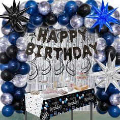 an image of a birthday party with balloons and stars in the air on display for everyone to see