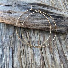 Dainty 14K gold filled hammered pattern wire hoops are lightweight and add a Boho chic for your outfit. Artistically designed to perfection, it also makes a thoughtful gift ideas for friend or loved one. - size: 1.5" (38mm), 2.0" (50mm), 2.5" (63mm)  diameter to choose from - 14K gold filled wire 0.9mm  - hammered Or flat pattern texture Gold-filled is made by adding a layer karat gold to a brass core. Cleaning and care : Clean with a polishing cloth, or washing in warm soapy water and buffing w Flat Pattern, Thoughtful Gift Ideas, Gold Filled Hoops, Pattern Texture, Flats Patterns, Hammered Gold, Recycled Metal, Soapy Water, Gold Texture