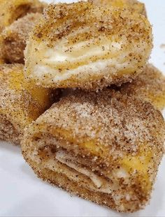 cinnamon sugar donuts stacked on top of each other