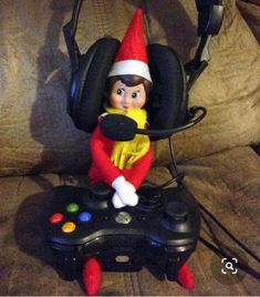 an elf with headphones is playing video games