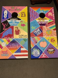 two colorful cornhole game boards sitting next to each other