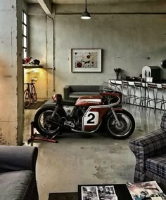 a motorcycle is parked in the middle of a living room