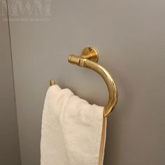 a towel hanging on the wall in a bathroom