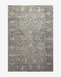 an area rug with blue, beige and grey colors on the bottom half of it