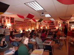 a classroom full of students sitting at desks