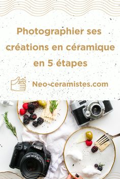 a table topped with plates filled with food and two cameras next to each other on top of