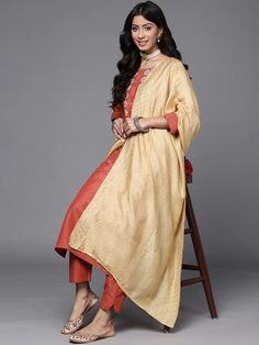 This is a beautiful 3-piece set. The set comes with straight cut kurta has floral embroidery detailing, round neck, 3/4th sleeves, calf length & side slits teamed with solid bottom has elasticated waistband and slip on closure and a contrast dupatta to match. Piece-3 Piece Set Color-Orange Kurta Fabric-Silk Blend Bottom Fabric-Silk Blend Dupatta Fabric - Silk Blend Work -Floral Embroidery Detailing Neck-Round Neck Sleeves- 3/4th Sleeves Kurta Length - Calf Length Bottom-Elasticated Waistband & S Contrast Dupatta, Embroidered Suit, Embroidery Detailing, Fabric Silk, Suit Set, Indian Wear, Straight Cut, Color Orange, Floral Embroidery