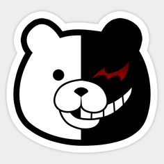 a black and white bear with red eyes sticker on it's face is shown