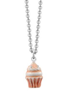 a necklace with a cupcake charm hanging from it's side on a ball chain