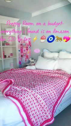 a bed with pink and white bedspread in a bedroom next to a book shelf