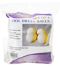 three wool dryer balls are shown in the package, and one is white with yellow tips