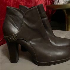 Never Worn Booties With 4-inch Heel And Round Toe, Booties With 4-inch Heel, Medium Width, And Round Toe, Formal Round Toe Booties With Buckle Closure, Formal Booties With Buckle Closure And Round Toe, Formal Brown Booties With Round Toe, Brown Combat Boots, Buckle Booties, Grey Booties, Tan Wedges