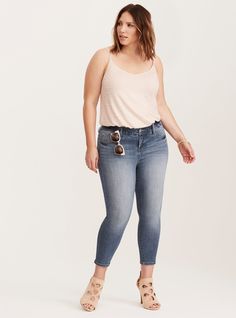 <div><div>Baby, you're a bombshell and now we've got the jeans to back you up. Made with our medium wash Premium Stretch denim - tons of stretch with extra recovery - the fit is all skinny from thigh to shoe-baring cropped ankle. The rearview, however, has been expertly constructed to lift, enhance and shape your curves, transforming your booty like never before.</div><div><ul><li style="list-style-position: inside !important; list-style... Women's Plus Size Jeans, Most Comfortable Jeans, New Street Style, Active Outfits, Plus Size Womens Clothing, Bra And Panty Sets, Plus Size Jeans, High Rise Jeans, Body Shape