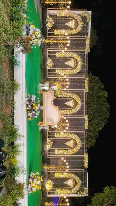 an aerial view of a wedding ceremony in the evening