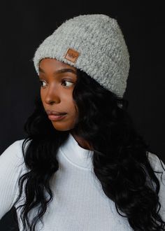 Keep warm and look stylish with our women's light gray knit beanie. This beanie is fleece lined for extra warmth and features a beautiful, neutral color. Perfect for keeping out winter's chill and getting all the compliments!  Light gray knit beanie Cuffed detail at the hemline Fleece lined Crown patch on the left side One size Designed in the U.S.A. Produced in China. 69% Polyester / 17% Nylon / 10% Wool / 4% Spandex Knitted Hats Kids, Knit Hat For Men, Knit Jewelry, Blouse Tank Top, Grey Beanie, Women's Beanie, Concrete Jungle, Knitting For Kids, Look Stylish