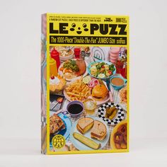 the cover of le petit puzz magazine with food and drinks on it's table