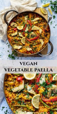 vegan vegetable paella in a pan with lemons and parsley