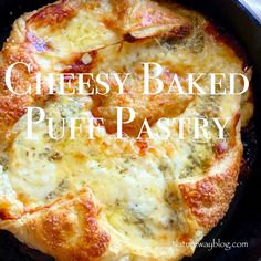 cheesy baked puff pastry in a cast iron skillet with text overlay