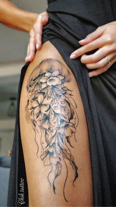 Never had a tattoo before? Don't wanna be cool? If you want to be cool, Tap to get your unique cool tattoo design Now! Extravagant Tattoos, Ocean Tattoos Sleeve Underwater, Ocean Thigh Tattoo, Jellyfish Thigh Tattoo, Thigh Tattoos Women Color, Unique Leg Tattoos, Big Tattoo Ideas, Coastal Tattoos, Lighthouse Tattoos