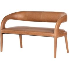 a brown leather bench sitting on top of a wooden frame