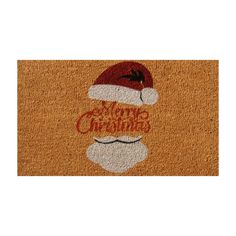 a door mat with an image of santa's hat and the words merry christmas on it