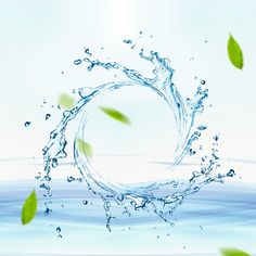 water splashing into the air with green leaves flying around