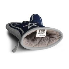 a blue and white slipper with a tag on it