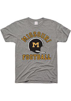 a gray t - shirt with the word missouri football printed in yellow and black on it