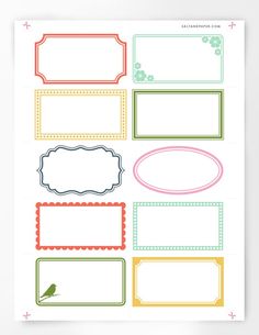 a pink sticker sheet with different frames and labels on the top, in front of a wooden background