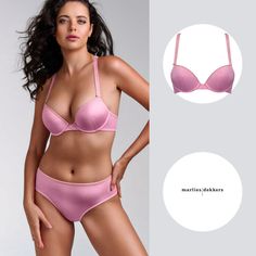 This sensual push up bra has cushions on the inside of the cups to create a sexy, deep cleavage. The bra closes at the front. It is crafted from a glossy fabric in the prettiest powder pink. A deluster printing technique is used to create a pattern of matte swirls in matching pink. The woven shoulder straps, that feature a playful quote, come together in a racerback with sexy satin lace-up design. The laces are woven through perfectly aligned eyelets, exuding feminine finesse. Gold colored detai Pink Underwire Bra With Removable Cups, Pink Full Cup Nursing Bra With Padded Cups, Full Cup Pink Nursing Bra With Padded Cups, Elegant Pink Nursing Bra With Removable Pads, Elegant Pink Nursing Bra With Built-in Bra, Elegant Fitted Pink Nursing Bra, Pink Feminine Bra With Removable Cups, Feminine Padded Underwire Bra, Elegant Padded Pink Bra