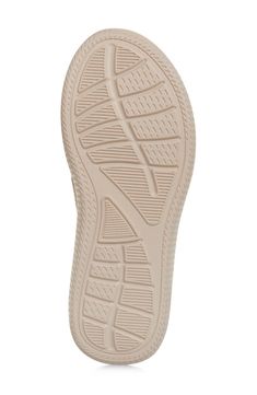 A wave texture brings traction and style to a flip-flop cushioned by a molded footbed and grounded by a nonslip EVA sole. Textile upper and lining/synthetic sole Imported Comfortable Synthetic Flip Flops With Textured Sole, Slip-resistant Synthetic Flip Flops, Synthetic Slip-on Flip Flops With Textured Sole, Textured Footbed Synthetic Slip-on Flip Flops, Textured Sole Synthetic Slip-on Flip Flops, Cushioned Flat Synthetic Flip Flops, Synthetic Flat Flip Flops With Textured Sole, Synthetic Flip Flops With Textured Sole, Shoe Makeover