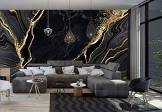 a modern living room with black and gold marble wallpaper, leather couches and chairs