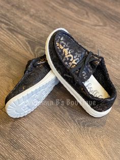 Fleece lined black shoe with white soles. Featuring the metallic gold and black leopard print throughout. We suggest staying true to size Leopard Sneakers, Black Shoe, Black Leopard Print, Black Leopard, Metallic Gold, Black Shoes, Gold Metal, Leopard Print, Sneakers