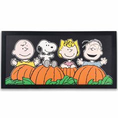 peanuts and friends on pumpkins framed in black