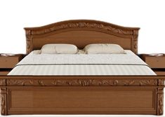 a bed with a wooden headboard and foot board on top of it, in front of a white background