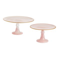 two pink plates sitting on top of each other