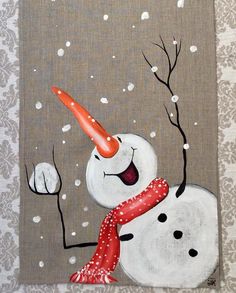 a painting of a snowman wearing a red scarf