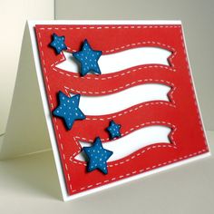 a red white and blue card with stars on it