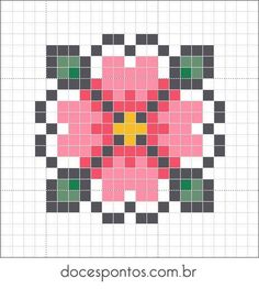 a cross stitch pattern with pink and green squares in the shape of a flower on a white background