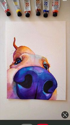 a painting of a dog's face with four different colored paints on the wall behind it