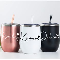 three personalized tumblers are shown with their names on them