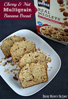 three slices of banana bread on a plate next to a box of cereal and nut muffins