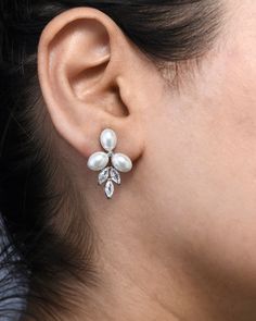 Infused with botanical elegance, these floral drop bridesmaid earrings are a marriage of nature's beauty and artisan craftsmanship. Each earring blooms with intricate floral designs, enhanced by the soft luster of imitation pearls and the brilliant sparkle of cubic zirconia. These earrings seamlessly blend classic allure with contemporary shimmer, making them a radiant choice for bridesmaids desiring both grace and glamour! ♥ ❤️Best Quality ❤️Best Pricing❤️Best Customer Service   🖤Specification Jewelry Chest, Copper Rose, Earrings Bridesmaid, Silver Drop Earrings, Mother Of The Groom, Bridesmaid Earrings, Bridesmaid Proposal, Bridesmaid Gift, Floral Designs