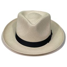 The Stetson Retro Panama Straw Fedora is your classic handwoven, panama style hat but with a bit of a Stetson twist. This hat is a genuine Panama hat meaning it's hand made from South American Toquilla tree fibers, giving this hat a unique charm thats 100% authentic. The hat also features a stylish grosgrain hat band in black to accent the natural colored fibers this hat is made from. Brim: 2.5" Crown: 4" Classic Brimmed Panama Hat In Solid Color, Classic Solid Brimmed Panama Hat, Classic Solid Panama Hat With Brim, Classic Solid Panama Hat, Classic Adjustable Solid Boater Hat, Fitted Fedora With Flat Brim For Travel, Fitted Fedora With Short Brim For Travel, Classic Panama Hat For Travel, Woven Panama Hat With Curved Brim