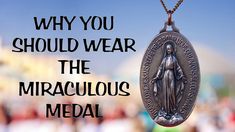 a medal with the words, why you should wear the miraculous medal