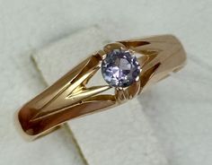 Vintage Original Rose Gold Ring with Alexandrite 583 14K, production of the USSR (1964)!!! Photos of this particular product Photos without photoshop and any filters Size of ring : 7 3/4 US Size of ring (finger height) : 6.25 mm. = 0,246 inches Size of Alexandrite (diameter) : 4.0 mm. =  0,157 inches Inserts: Alexandrite (lab. created) Product weight: 3.02 gr. Production country: Erevan / Armenia (1964) The colour of the stone changes depending on the lighting! The product is in Ideal condition !!! Советское Оригинальное Золотое Кольцо с Александритом, выполнено из розового золота 583 пробы 14 К, производство  СССР (1964)!!!  Фотографии именно этого изделия Фотографии без фотошопа и каких либо фильтров Размер кольца : 18,0 Размер кольца ( ширина вдоль по пальцу ) : 6,25 мм. Размер александ Alexandrite Vintage Ring, Ruby Rings For Men, Alexandrite Engagement Ring Vintage, Antique Jewelry Rings, Alexandrite Engagement Ring, Alexandrite Ring, Jewelry Lookbook, Fantasy Jewelry, Ruby Ring